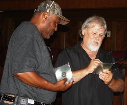 Keel signs a CD for Darrell Sims