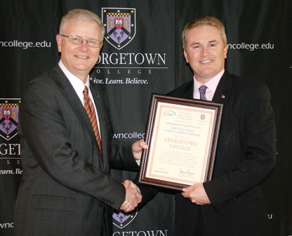 Georgetown President M. Dwaine Greene and Commissioner Comer