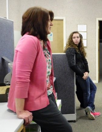 Student Jade Florence listens to FSA director describe federal program