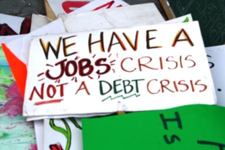 jobs crisis not debt crisis sign