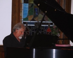 Singer - songwriter Bobby Keel entertains on guitar and piano